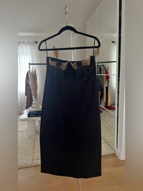 Black Pencil Dress with Beige Trim and Decorative Accents